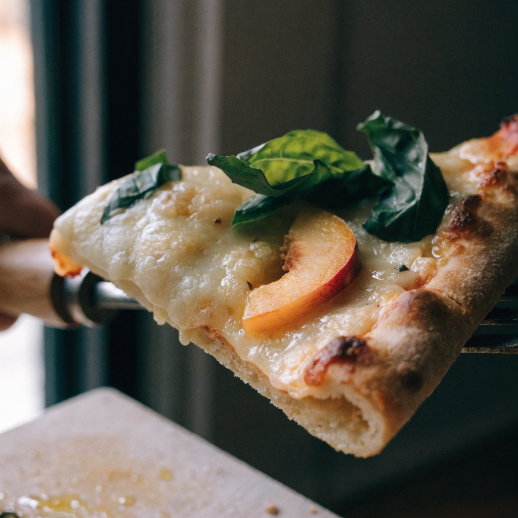 Close-up of peach & basil naan pizza (easy savory flatbread)