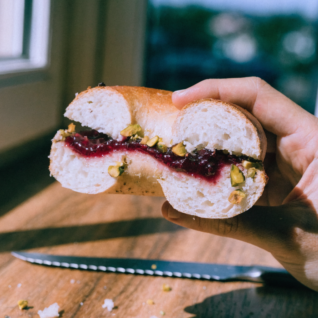 Close-up of raspberry pistachio sourdough bagels